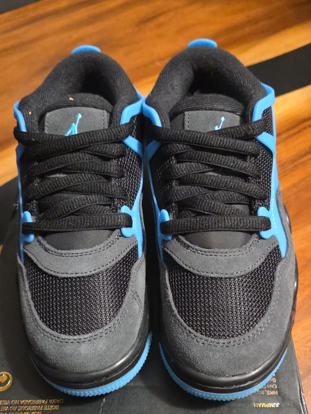 Air Jordans 4RM - Black and Gamma Blue Size 4 Youth